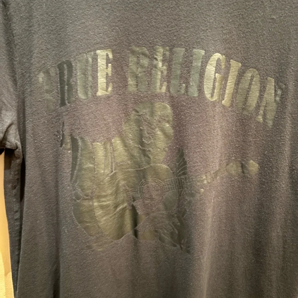 True Religion Short sleeve t-shirt featuring a tonal Buddha Logo graphic Size M